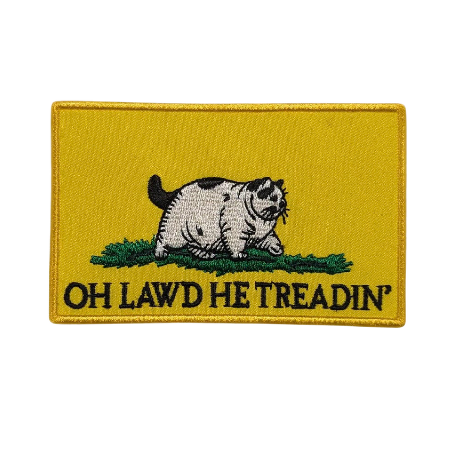 Embroidered patch with a cat and text 'OH LAWD HE TREADIN'' on a yellow background
