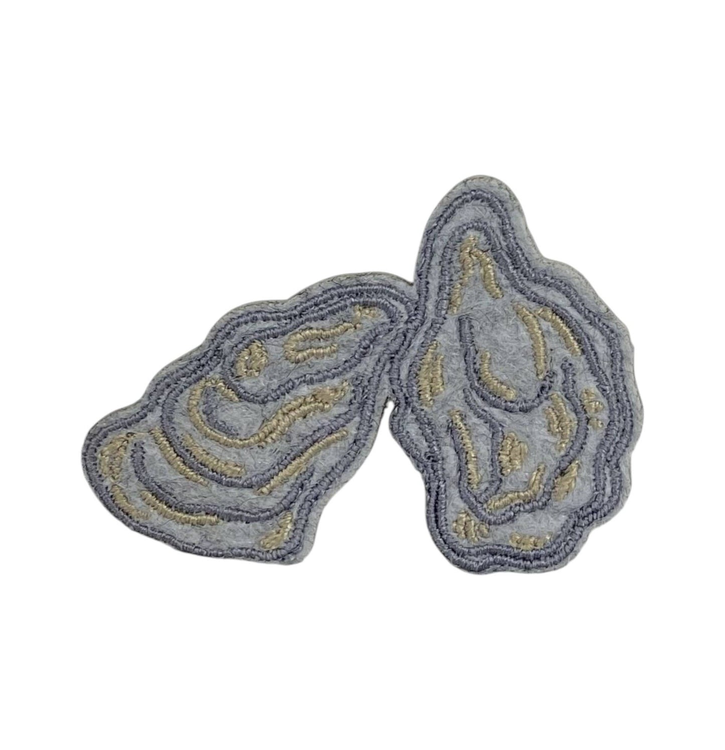 Gray and gold decorative patch on a white background
