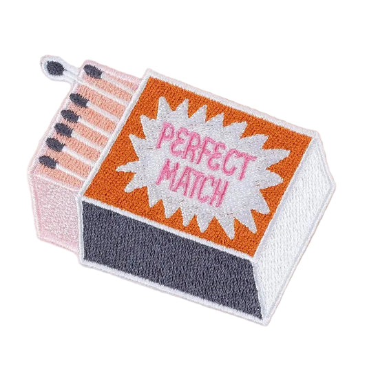 Matchbox patch with 'Perfect Match' text on a beige background