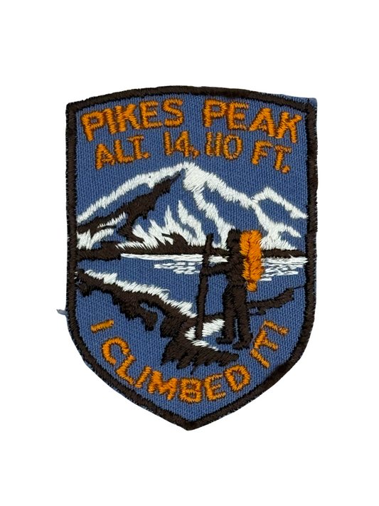 Patch with mountain design and text 'Pikes Peak Alt. 14,100 FT. I Climbed It' on a white background