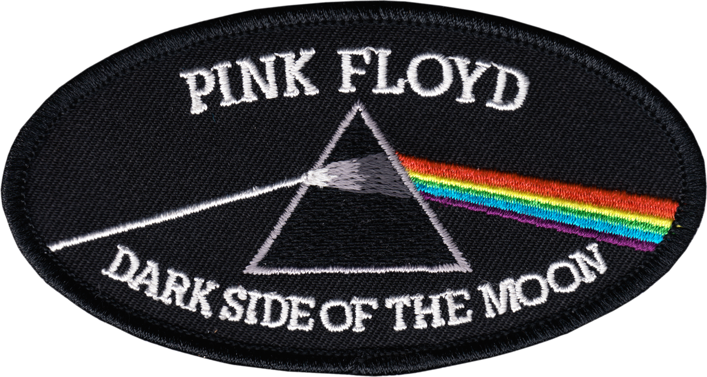 An oval embroidered patch featuring the Pink Floyd 'Dark Side of the Moon' design, with white text, a black triangle, and a rainbow prism on a black background.