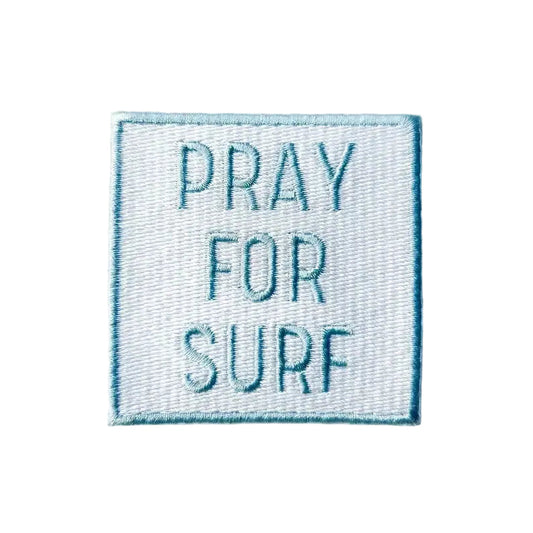 Embroidered patch with 'PRAY FOR SURF' text on a white background