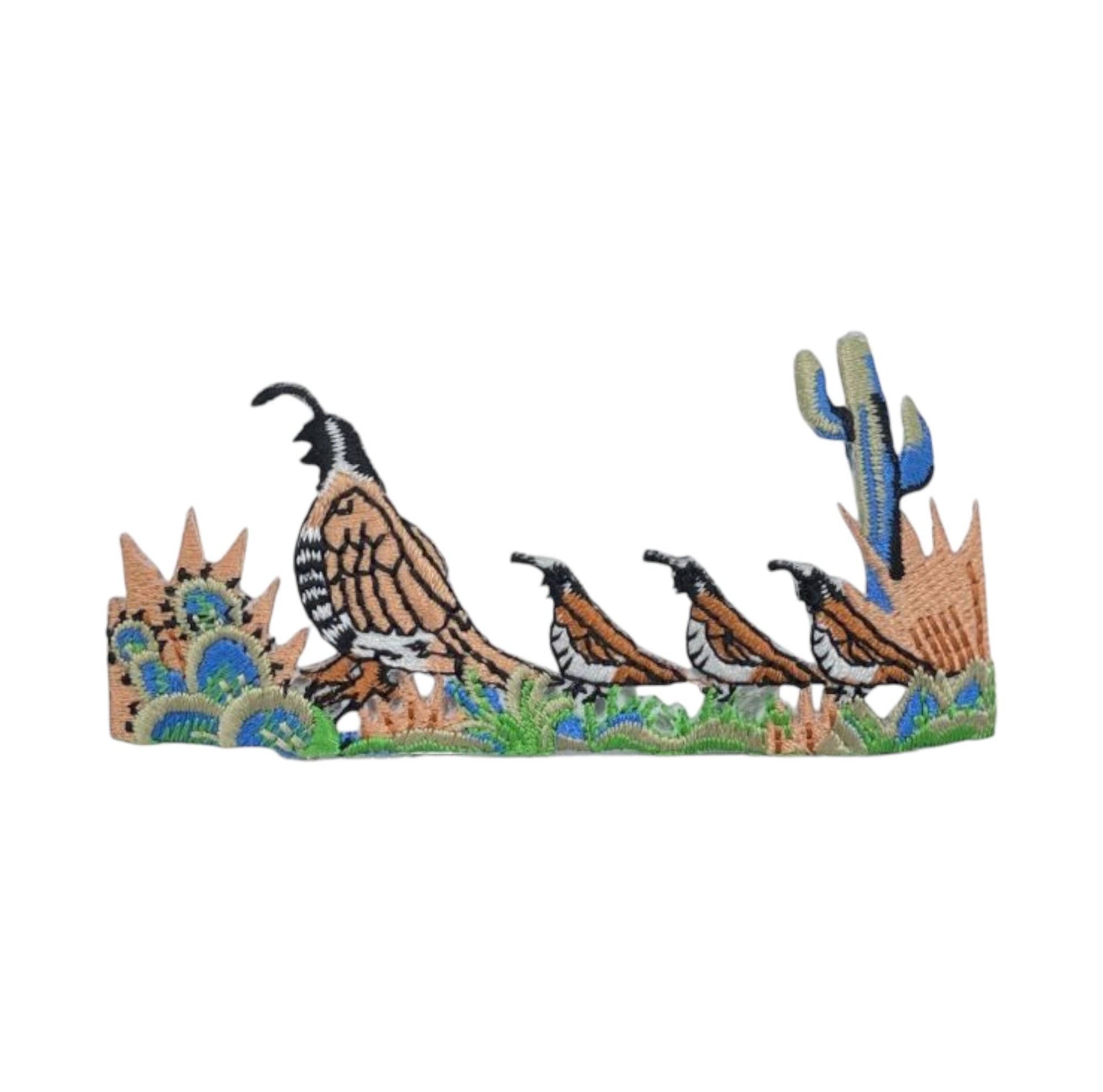 Decorative wall art with quails and cacti on a white background