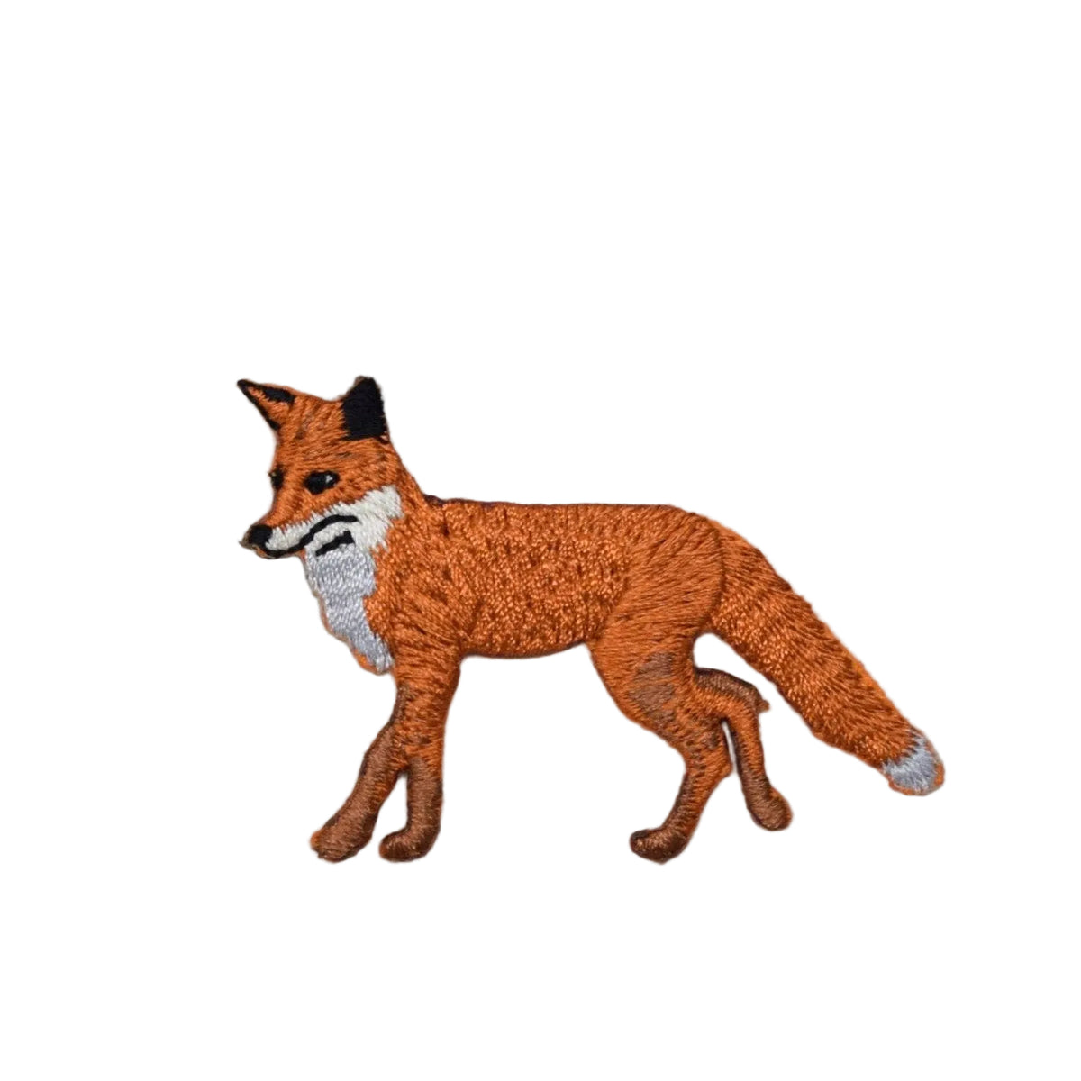 Embroidered patch of a fox on a textured fabric background