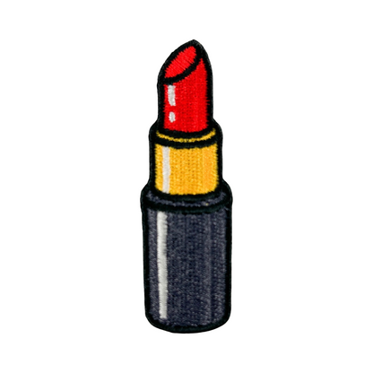 Patch of a red lipstick on a white background