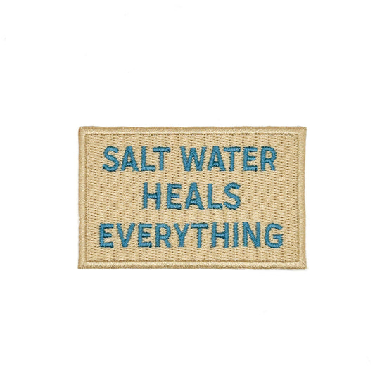 Doormat with 'Salt Water Heals Everything' text on a white background
