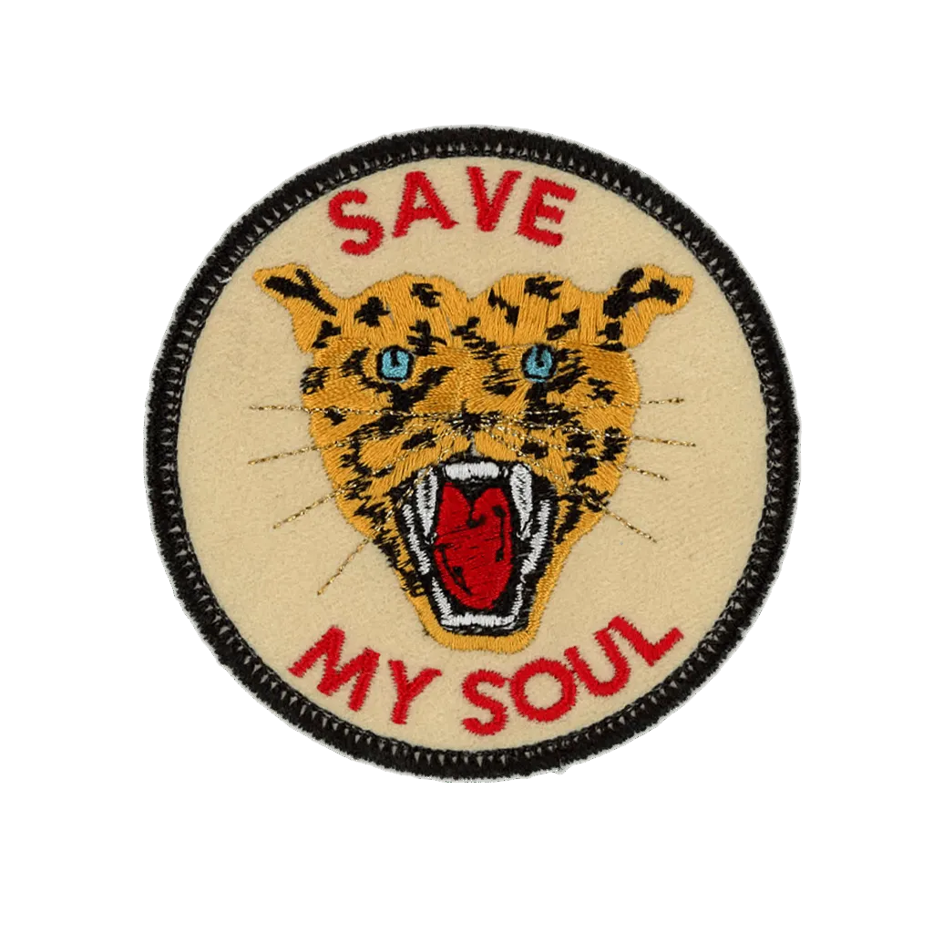 round iron on patch with black border that reads, save my soul with a spotted leopard in the center