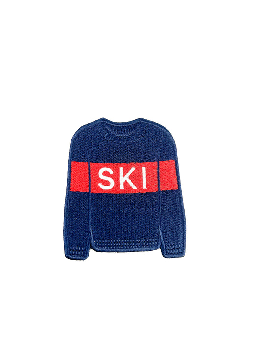 Blue sweater with a red band displaying the word 'SKI' on a white background