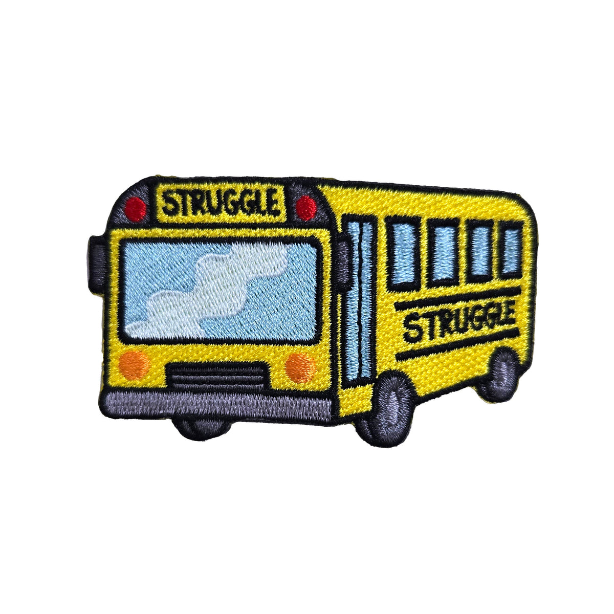 An embroidered patch of a yellow school bus with the word 'STRUGGLE' on the front and side, shown on a plain white background.