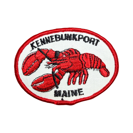 Embroidered patch with a red lobster and text 'Kennebunkport, Maine' on a white background