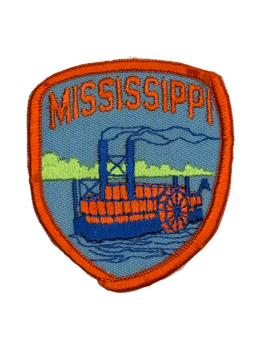 Patch with 'Mississippi' text and steamboat design on a white background