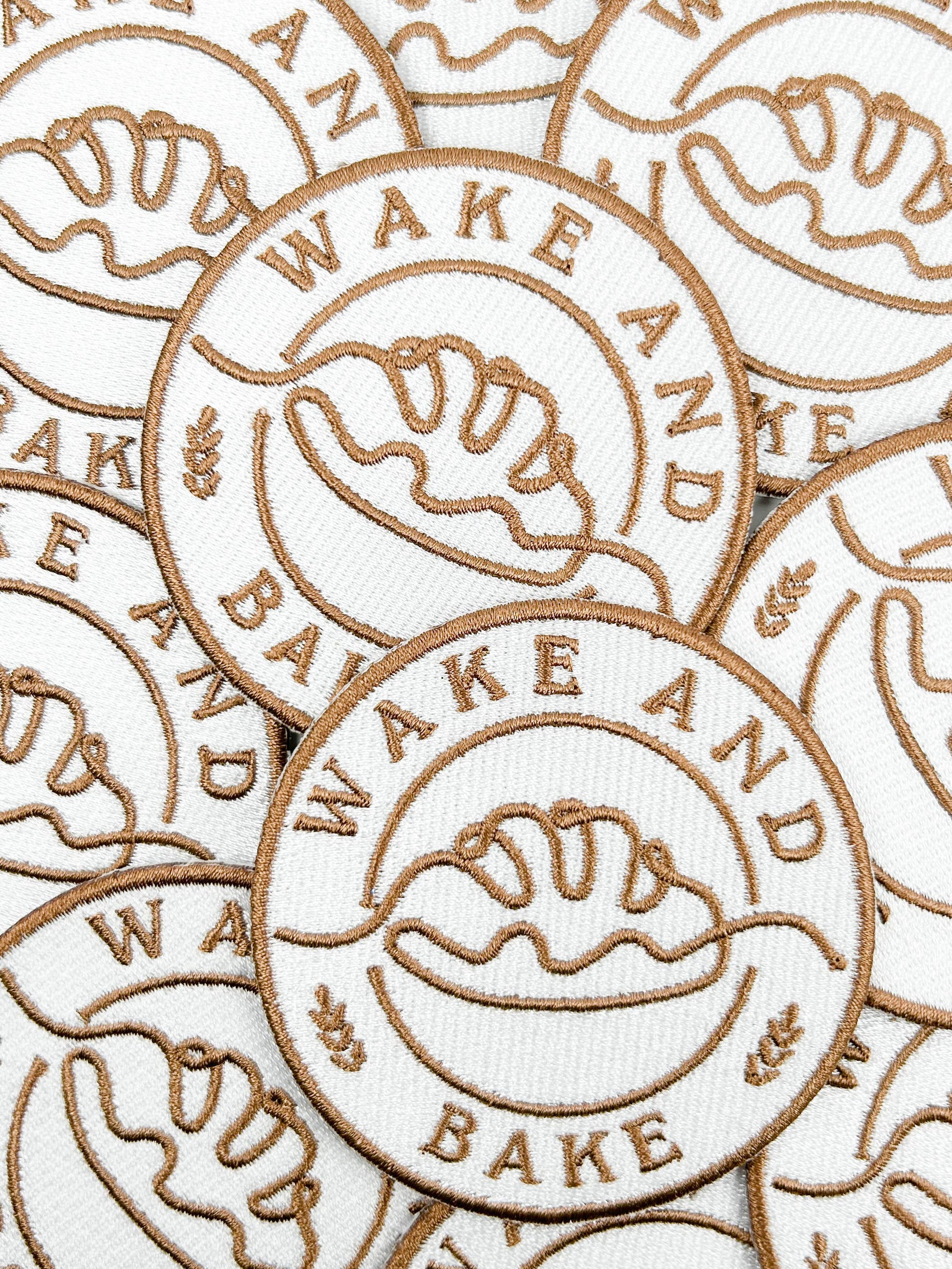 Multiple 'Wake and Bake' branded items with logo on a white background