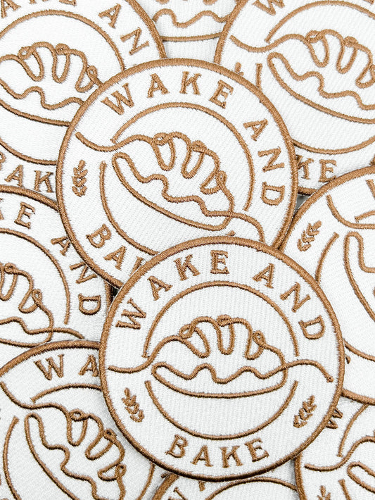 Multiple 'Wake and Bake' branded items with logo on a white background