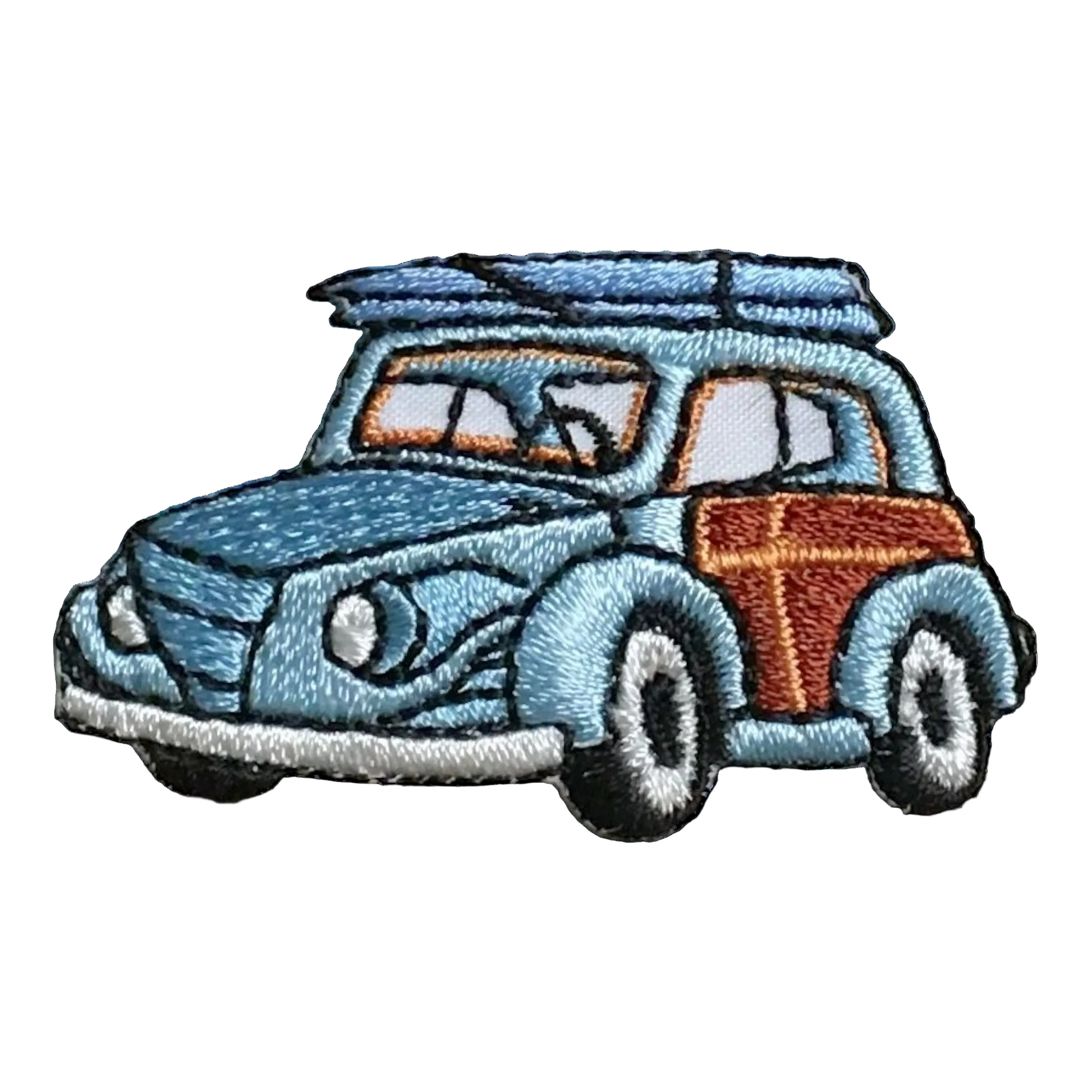 Embroidered patch of a vintage car with a white background
