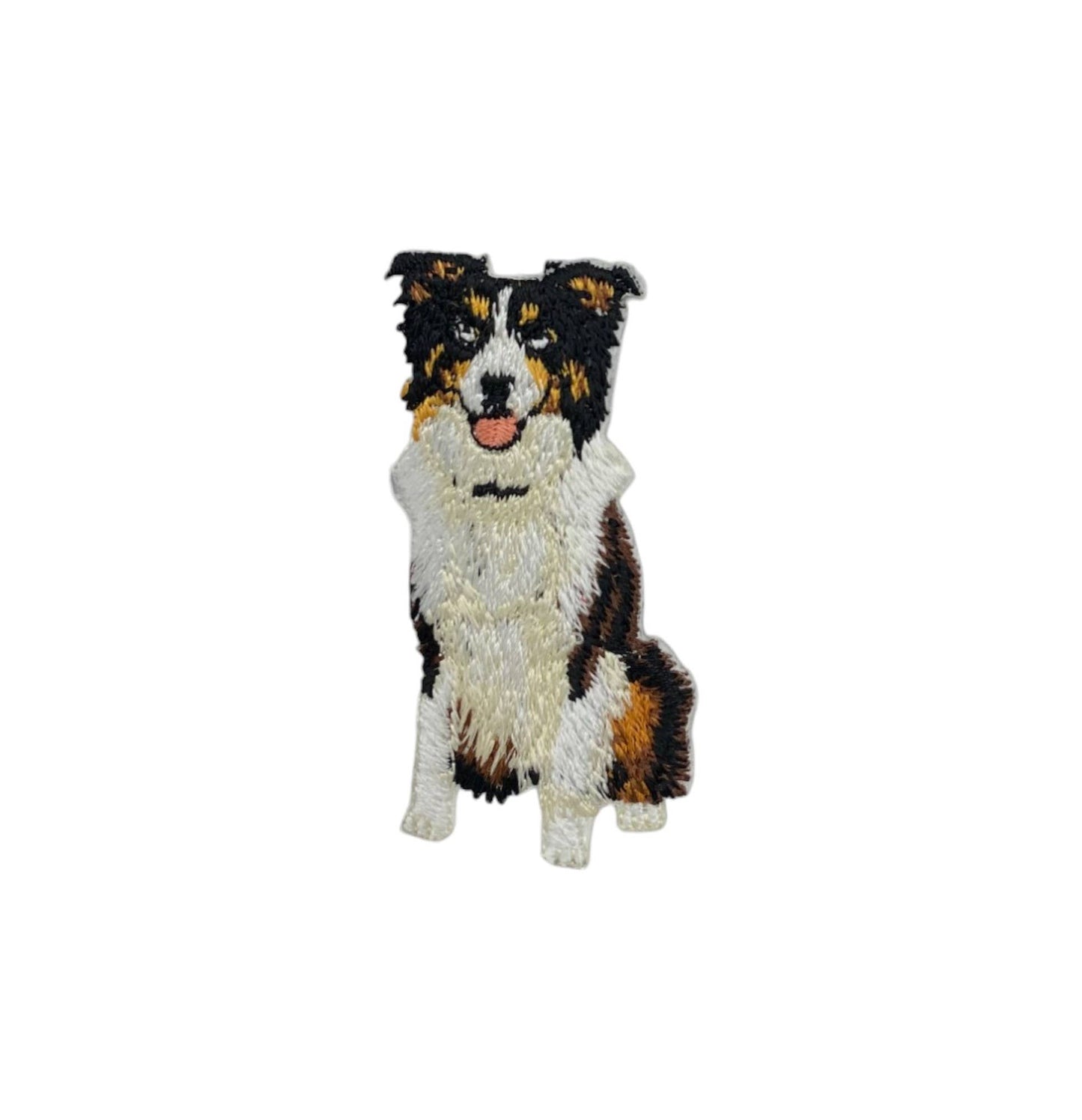 Embroidered australian shepard dog patch on a white background