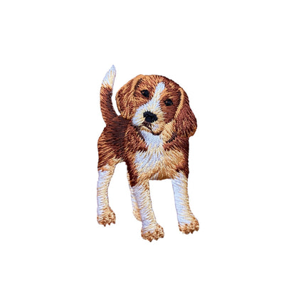 Embroidered patch of a brown and white beagle on a white background