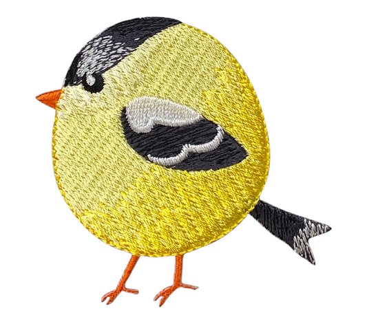 Embroidered patch of a goldfinch on a white background