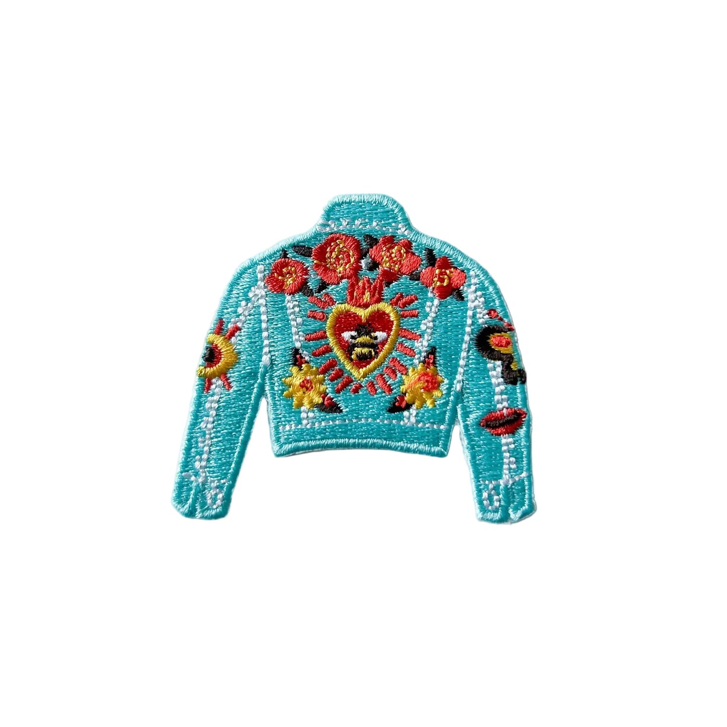 Colorful embroidered jacket design patch on a light gray background