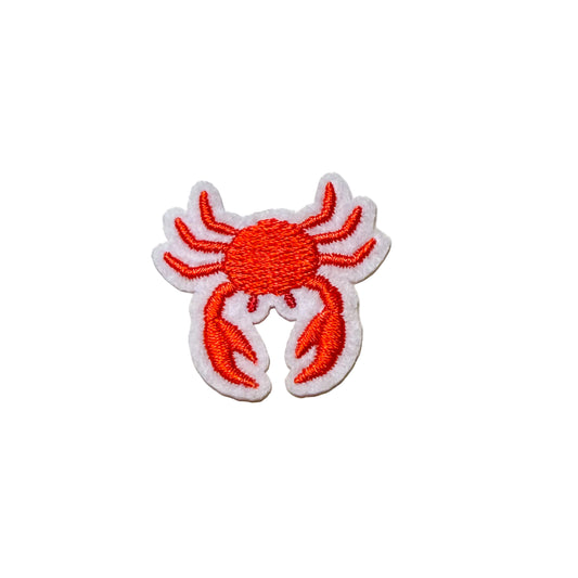 Red crab patch on a white background