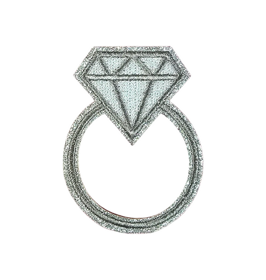 Embroidered diamond ring patch on white background.