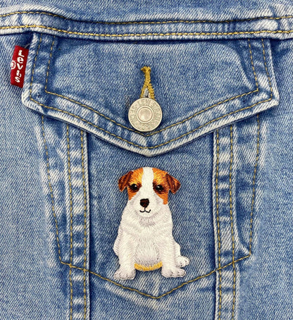 Denim jacket with a dog patch on the pocket