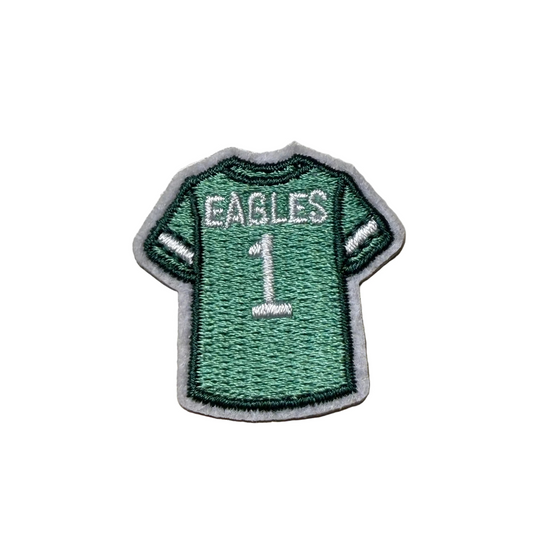 Green jersey patch with 'EAGLES' and number '1' on a light gray background