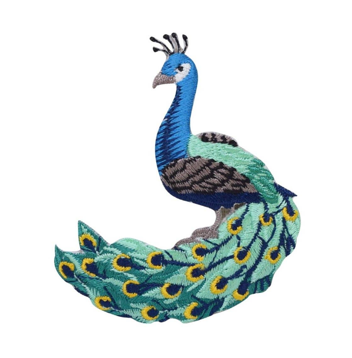 Embroidered peacock design facing left on a white background