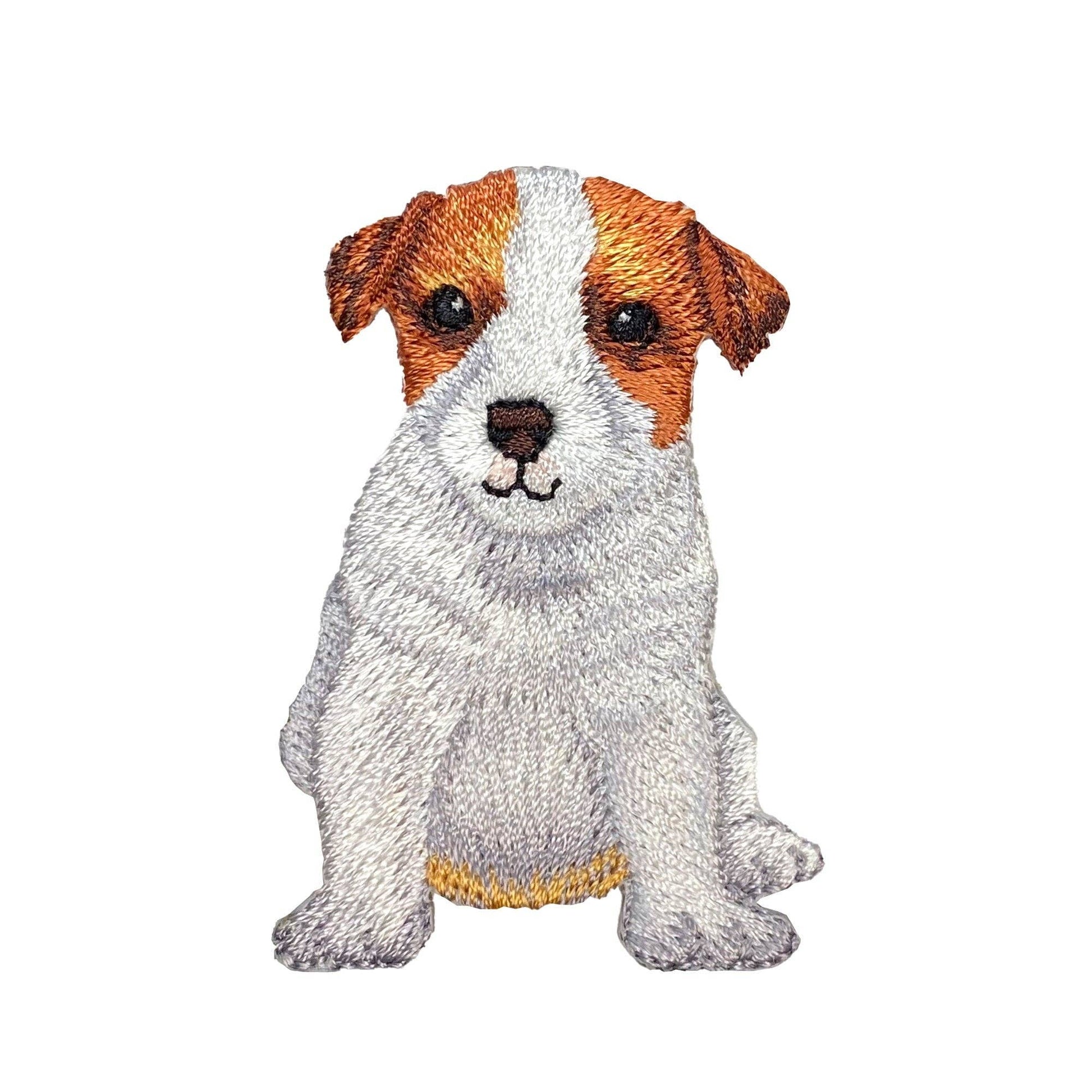 Embroidered patch of a jack russell terrier with a white and brown color pattern on a white background.