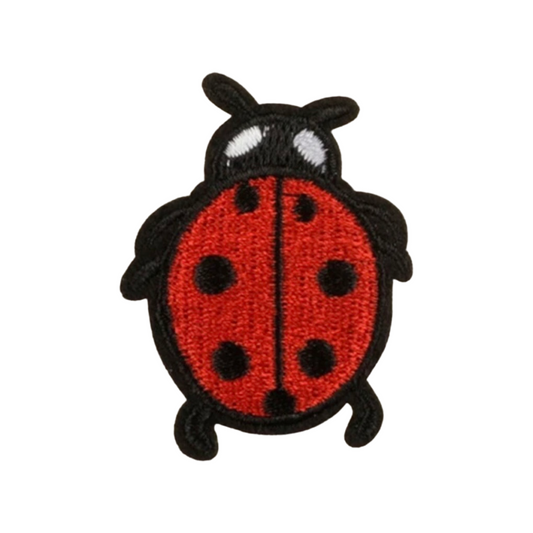 embroidered ladybug patch on a white background