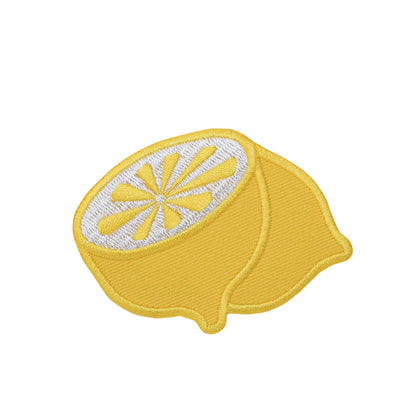 Patch of half a lemon on a white background