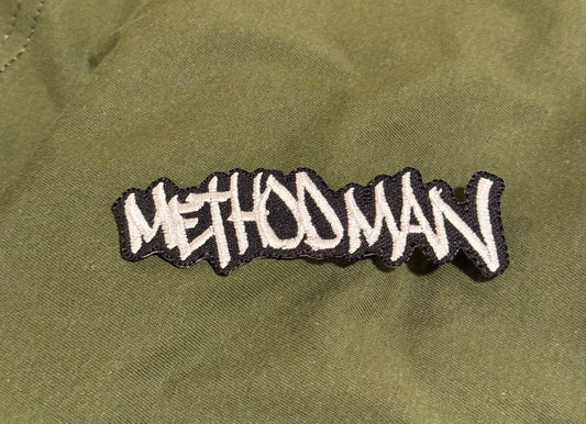 Embroidered patch with 'Methood Man' text on a green fabric background