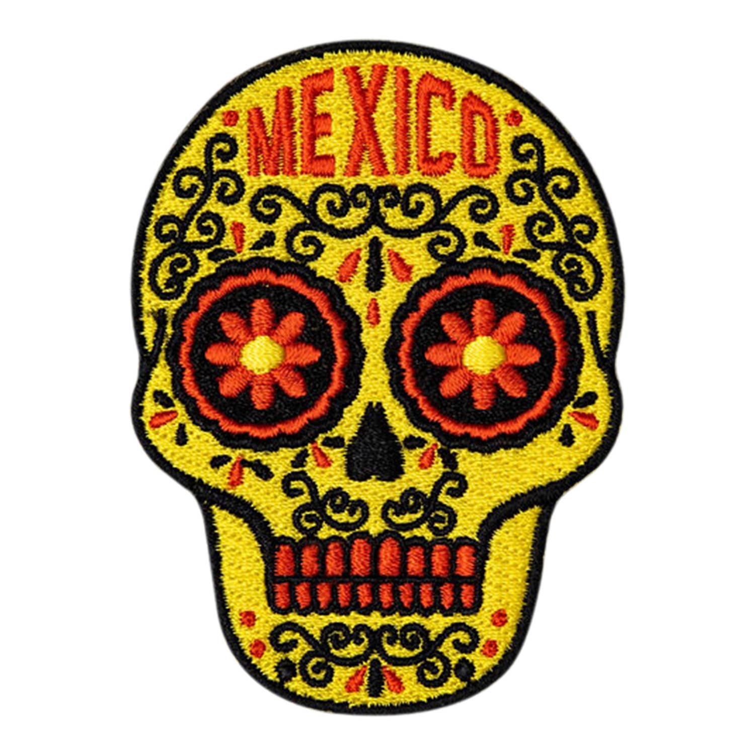 Colorful yellow skull design with 'Mexico' text on a white background
