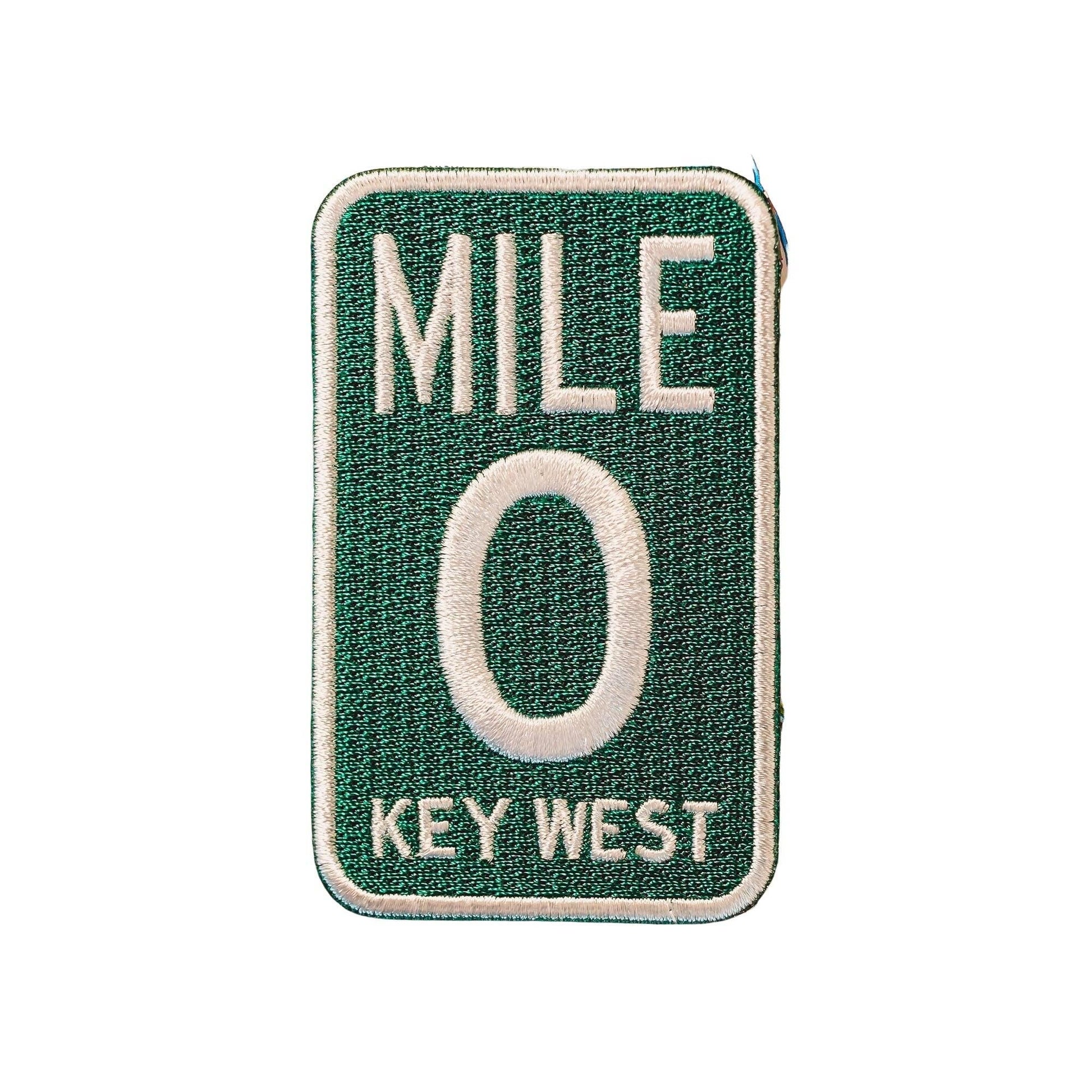 Patch with 'Mile 0 Key West' text on a green background