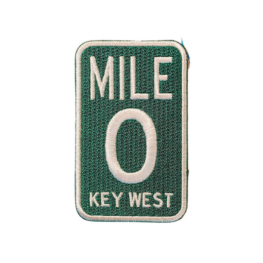 Patch with 'Mile 0 Key West' text on a green background
