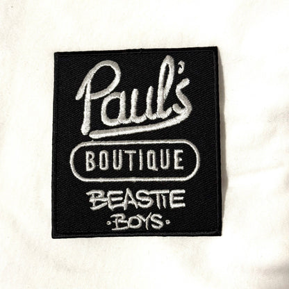 Patch with 'Paul's Boutique Beastie Boys' text on a white background