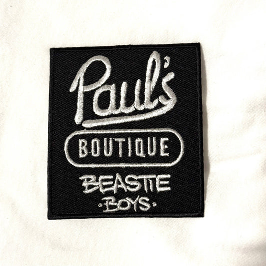Patch with 'Paul's Boutique Beastie Boys' text on a white background