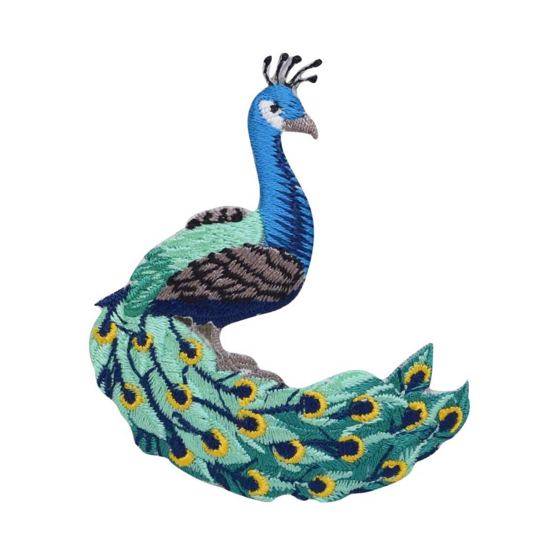 Embroidered peacock design facing right on a white background