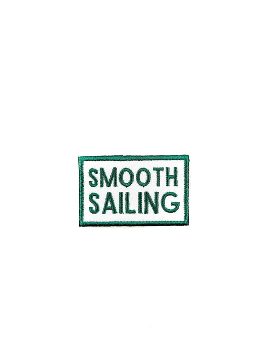 Patch with "SMOOTH SAILING" text on a white background