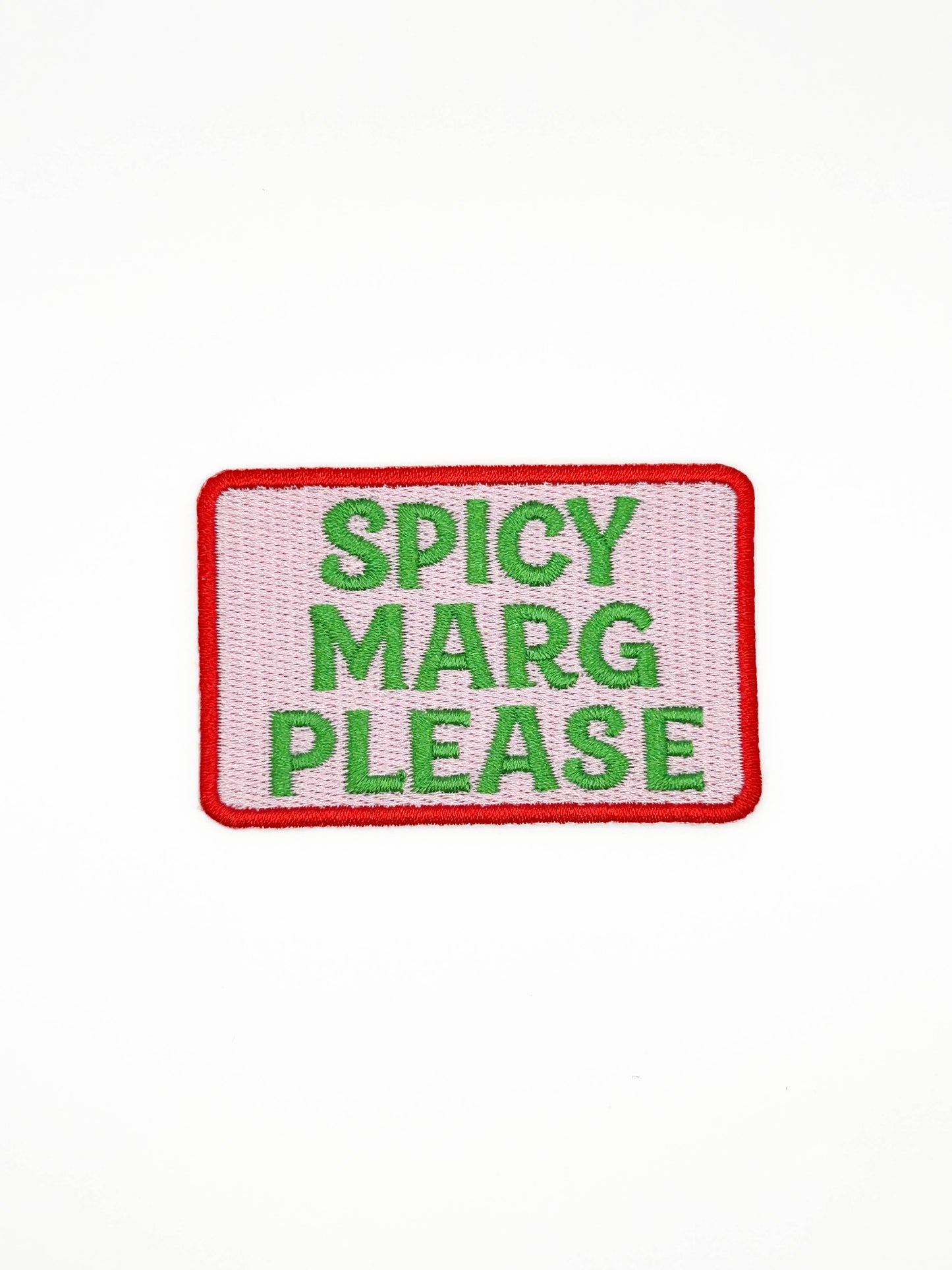Embroidered patch with 'Spicy Marg Please' text on a white background
