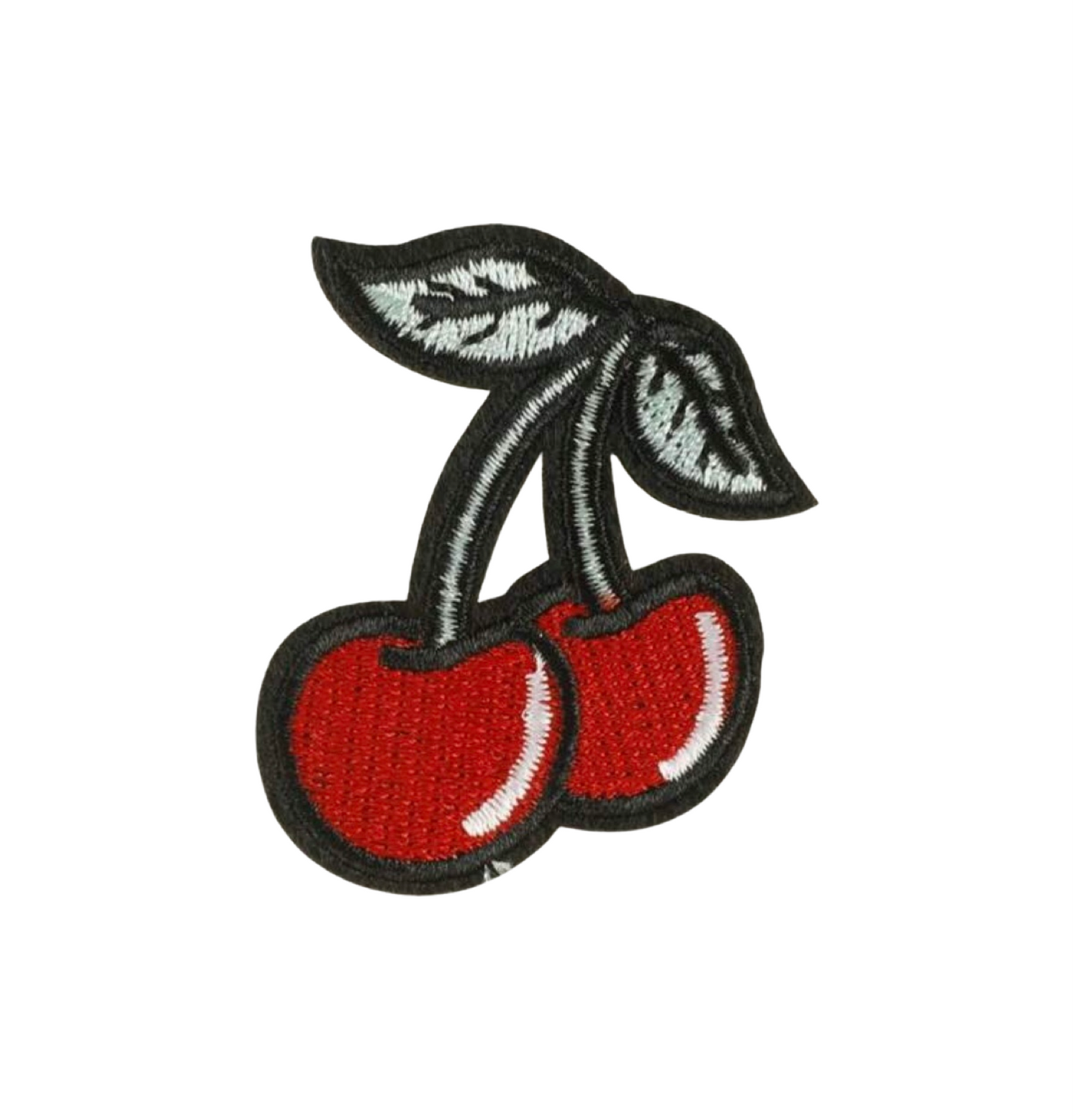 Embroidered patch of two red cherries with green leaves on a white background