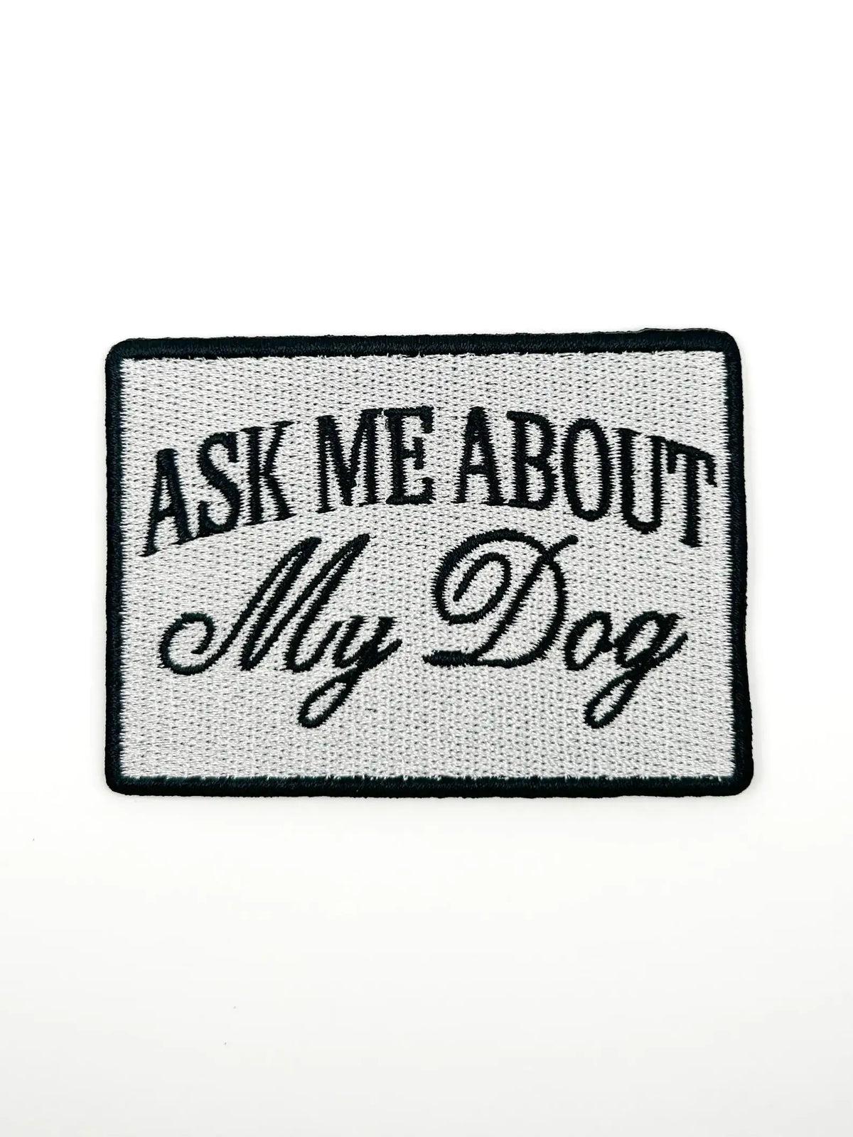 Patch with 'Ask Me About My Dog' text on a white background