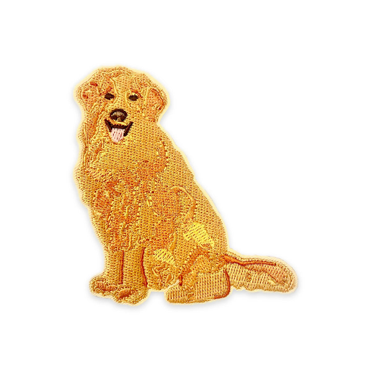 Embroidered patch of a golden retriever on a white background