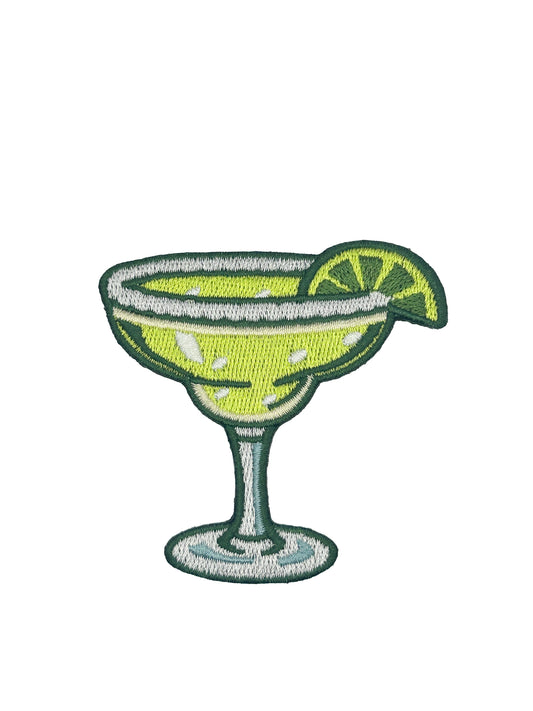 An embroidered patch of a classic margarita cocktail in a margarita glass, garnished with a lime wheel, shown on a plain white background.
