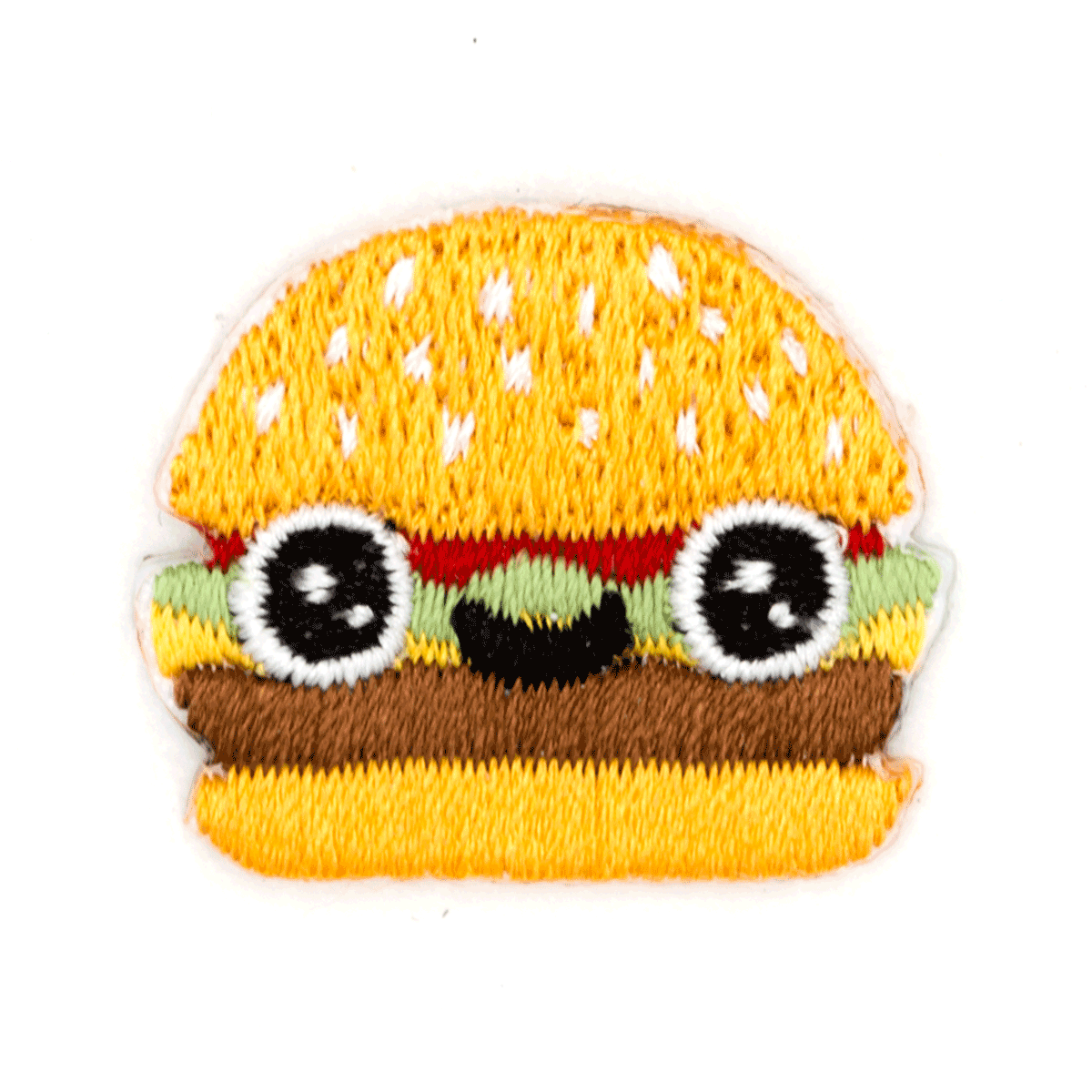 A cute embroidered patch shaped like a hamburger with a smiling face, featuring yellow bun, green lettuce, red tomato, brown beef patty, and white sesame seeds, on a plain white background.