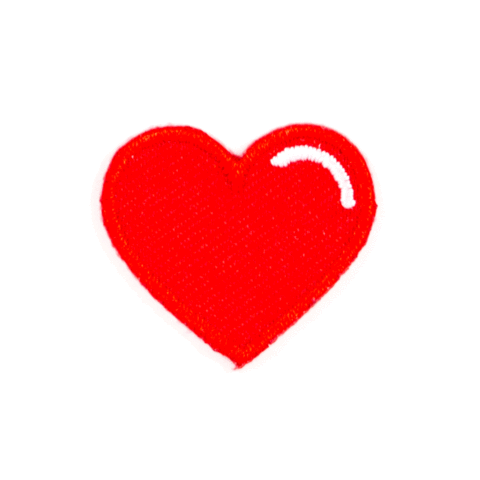Red heart-shaped object on a white background
