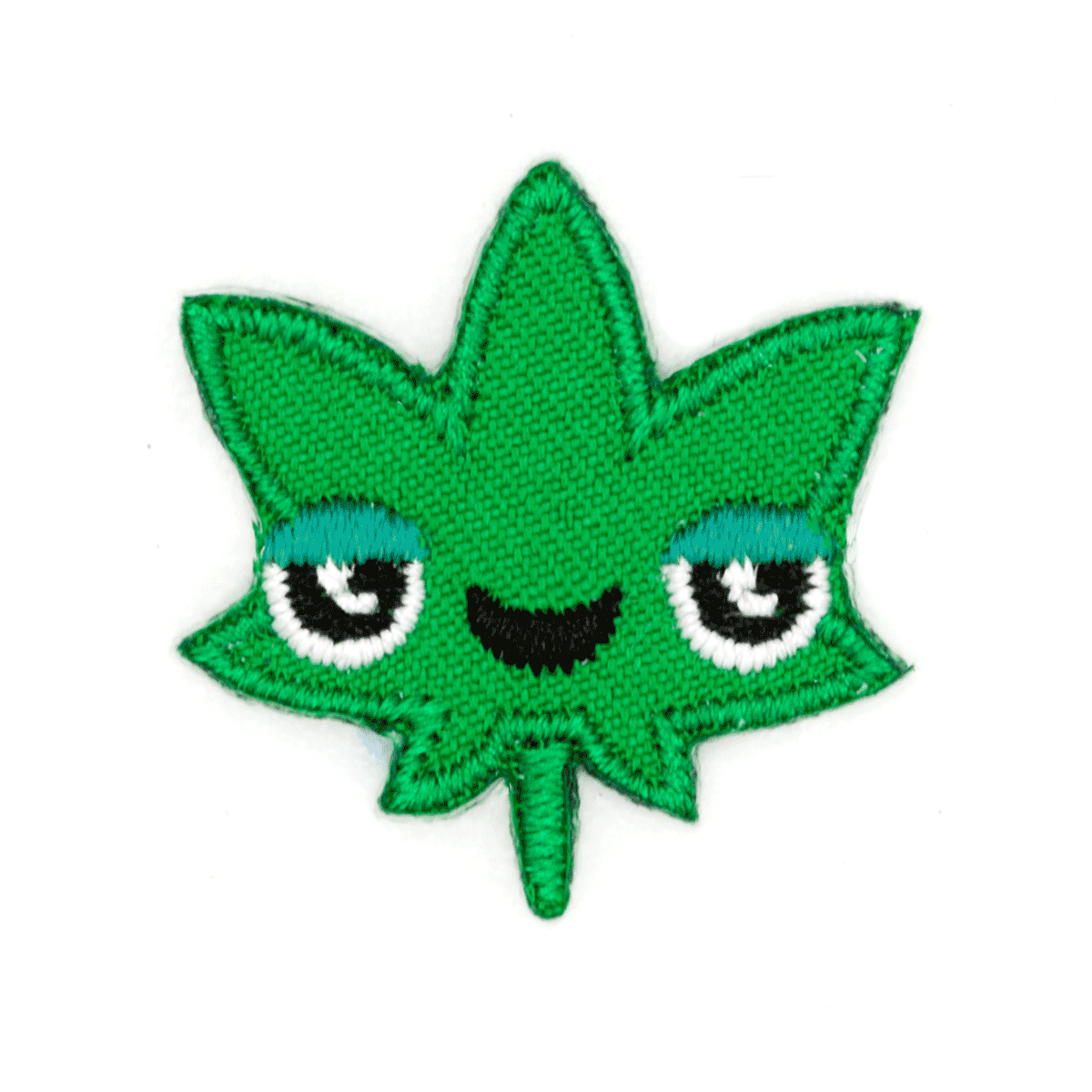 A green embroidered patch shaped like a cannabis leaf with a cute cartoon face featuring blue-tinted eyes, white sclera, and a black curved mouth, shown on a plain white background.