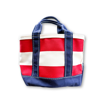 Vintage L.L.Bean mini Boat & Tote with red, white, and navy rugby stripes, navy handles and base, and white contrast stitching