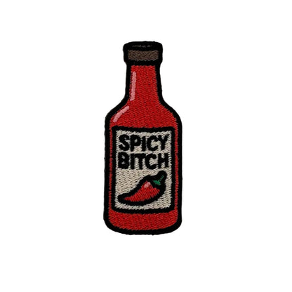 Embroidered patch of a hot sauce bottle with 'Spicy Bitch' text on a white background