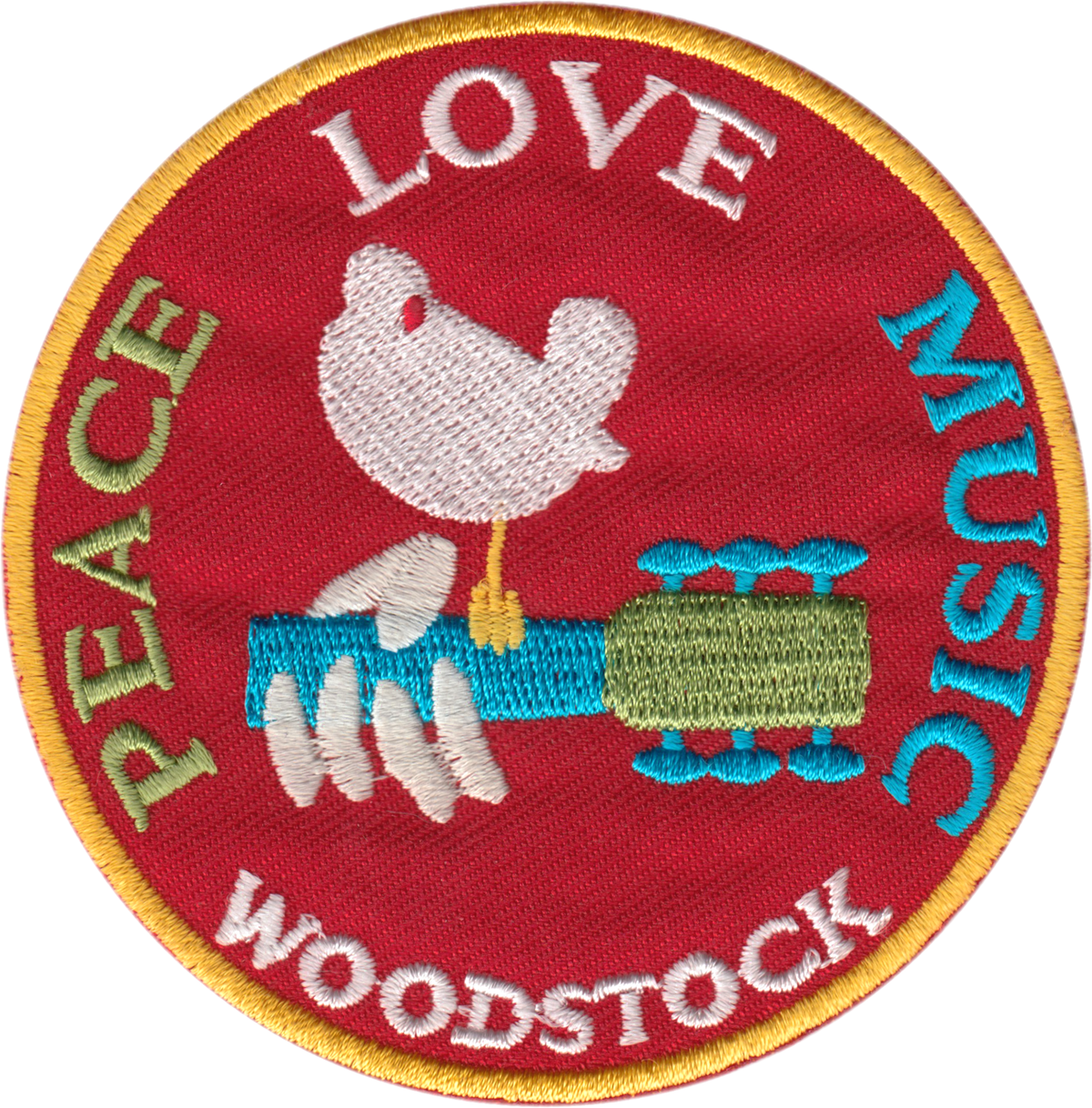 A circular embroidered patch with a red background, gold border, and multicolored text reading 'LOVE MUSIC' and 'PEACE WOODSTOCK,' plus a white dove and guitar illustration.